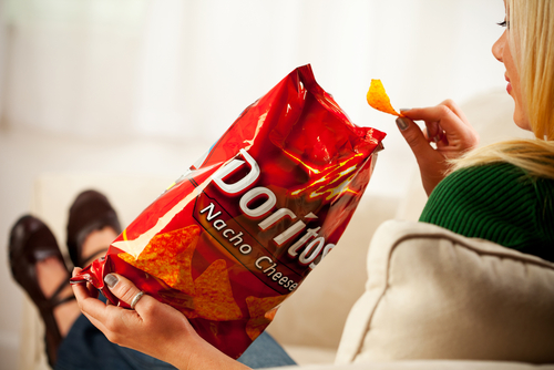 woman eating doritos