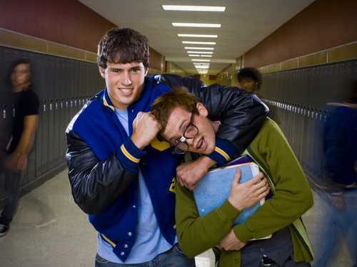 jock bullying a nerd