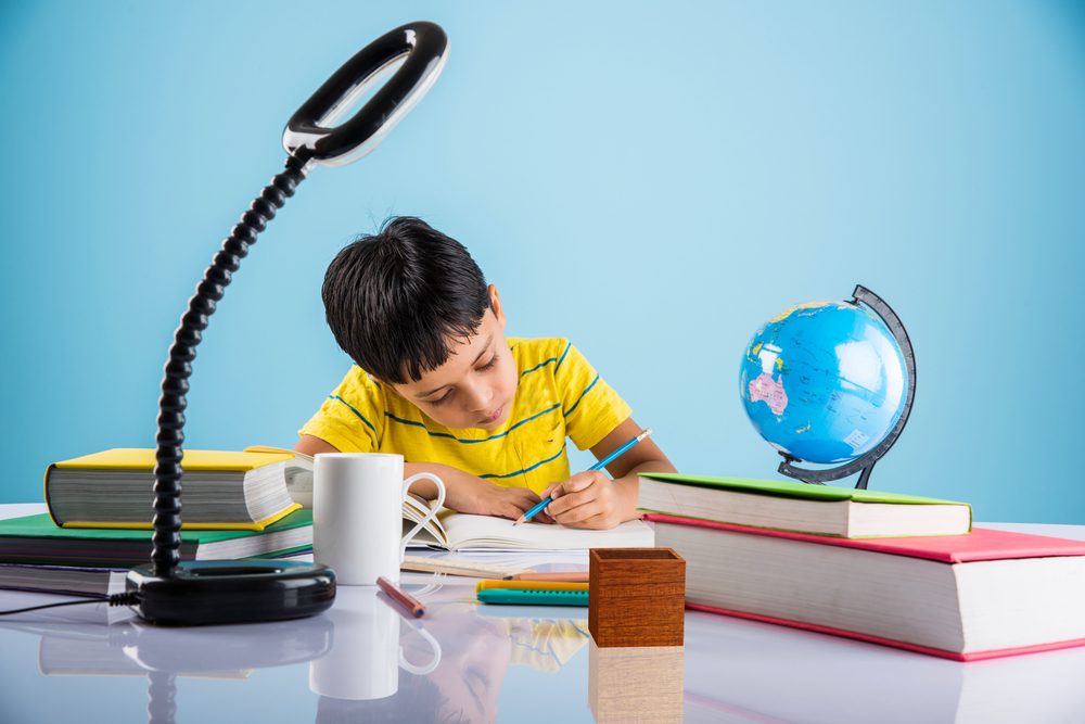 kid studying homework child