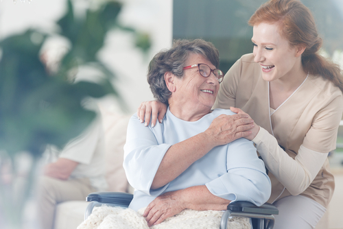 woman caring for elderly woman