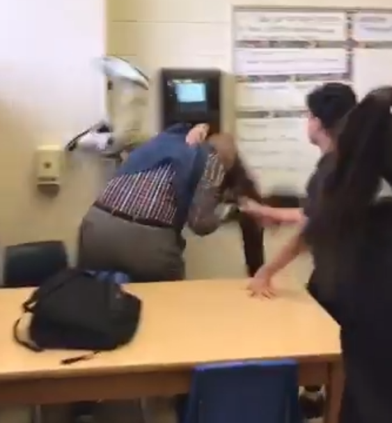teacher flipping student